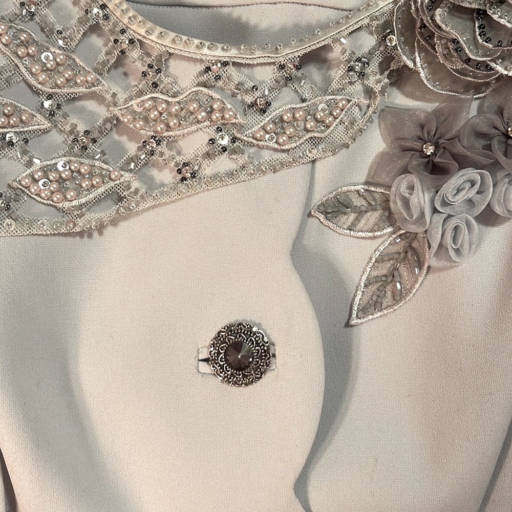 Louise Ricci Dove Gray lined Designer Suit. The hem jacket is scalloped & skirt.